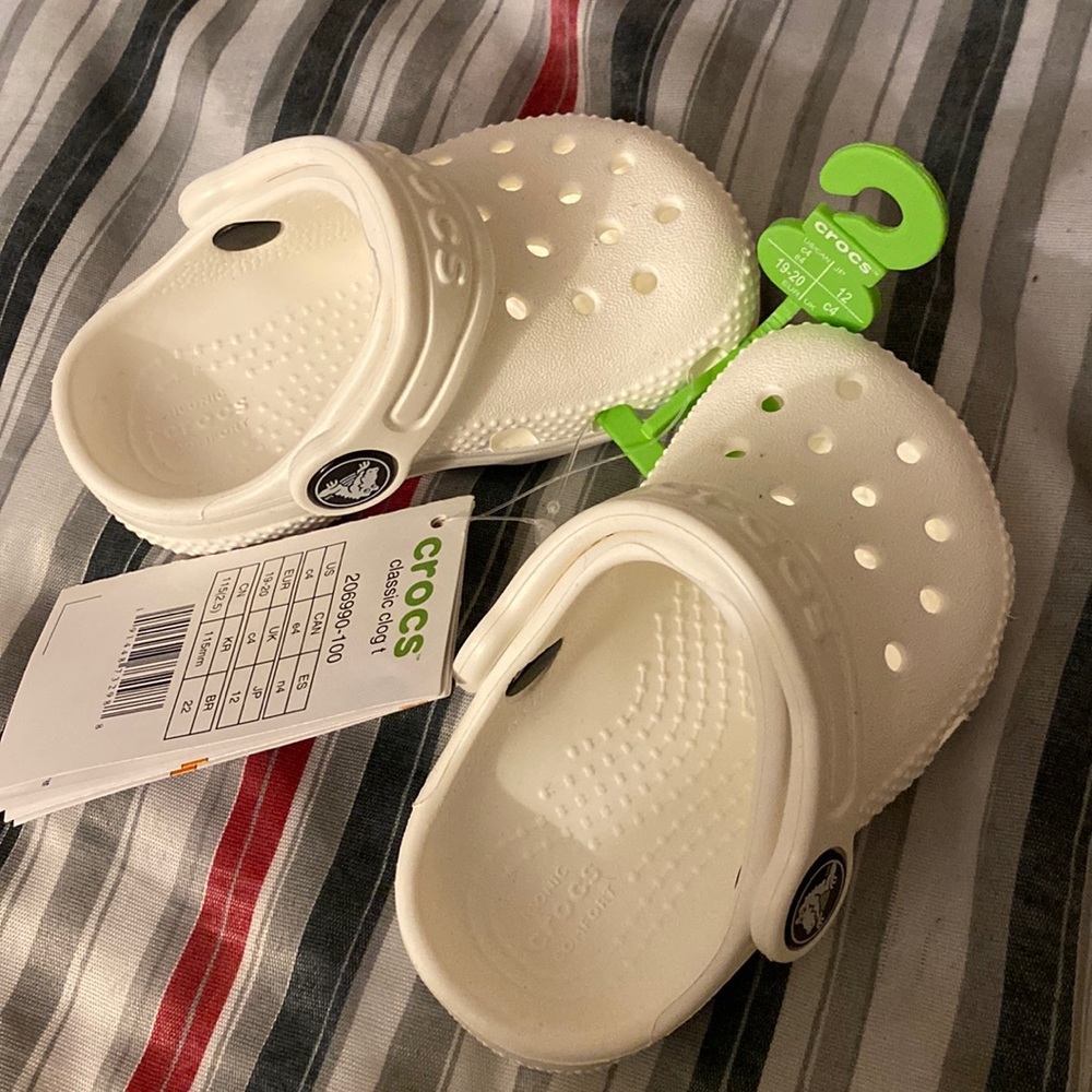 Brand new white baby crocs size 4 bought the wrong size